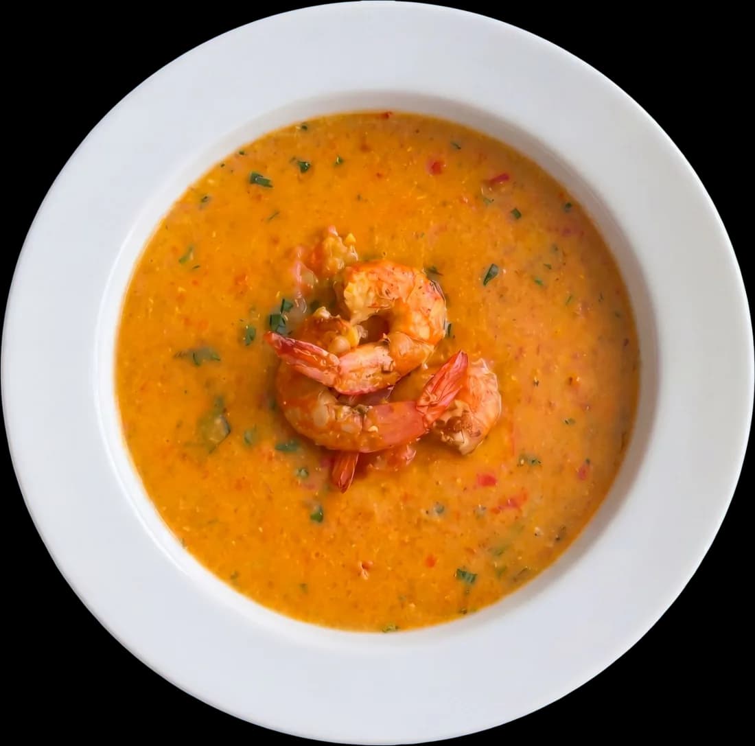 Bol de bobó de crevettes fumant servi avec du riz au coco
